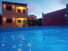 Duplex com 2 quartos com piscina e estacionamento